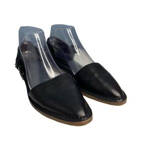 Delman black leather flat with fringe heel and rubber sole. Size women 8.5